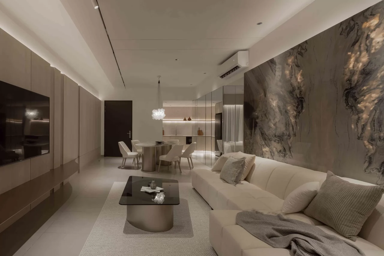 Actual showroom photograph of the Lumina Residences open-plan living and dining area